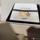 Bracelet noir médaille témoin