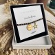 Bracelet noir médaille témoin